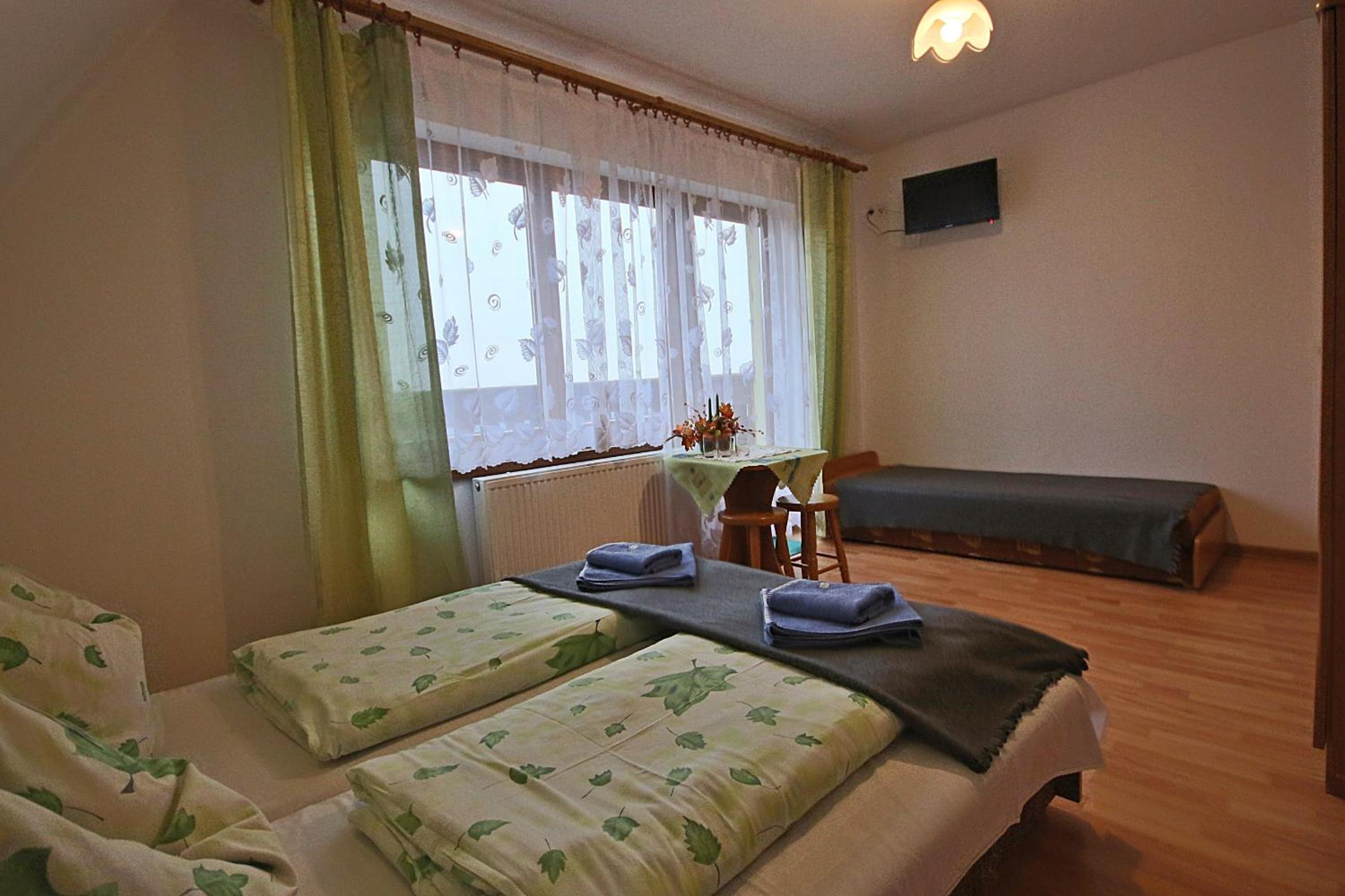 Triple Room with Balcony at Noclegi Brzegi