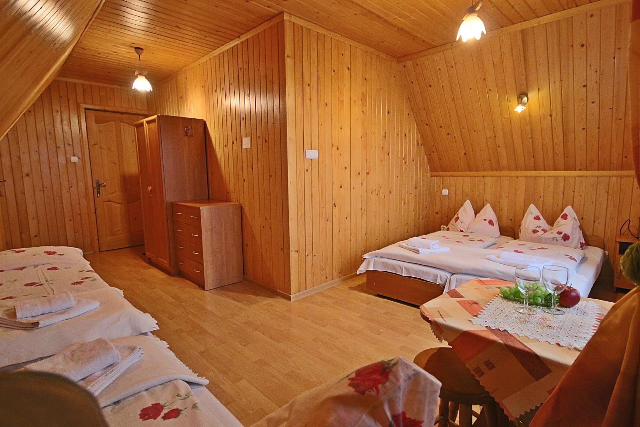 Quadruple Room with Balcony at Noclegi Brzegi